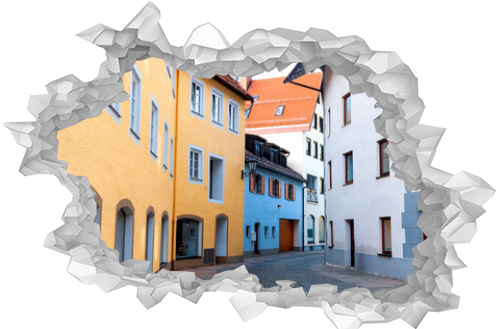 Colorful buildings along a street in historic Fussen, is a small town in, Germany.