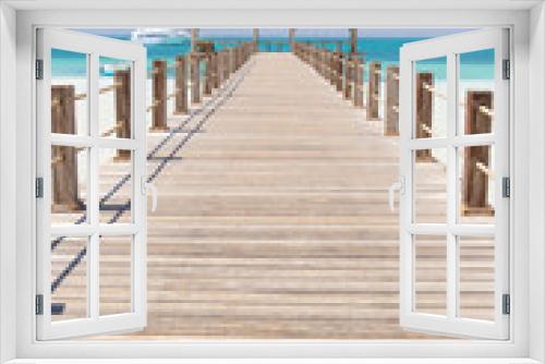 Fototapeta Naklejka Na Ścianę Okno 3D - Wooden Pier at Orange Bay Beach coastline of Giftun island, Hurghada, Red Sea, Egypt.
