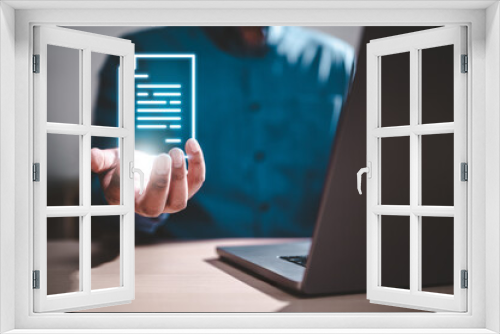 paperwork, report, data, document, management, marketing, research, innovation, working, system. A man is holding a paper. Concept of working on a project or document on a computer.