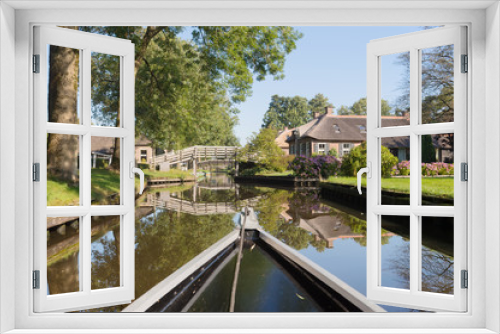 Fototapeta Naklejka Na Ścianę Okno 3D - With boat in Dutch village