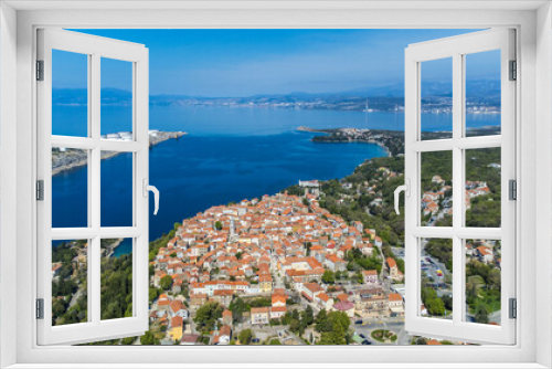 Fototapeta Naklejka Na Ścianę Okno 3D - Omišalj, a charming old town perched on a cliff overlooking the Adriatic Sea, is situated on the picturesque Krk Island in Croatia captured from a drone