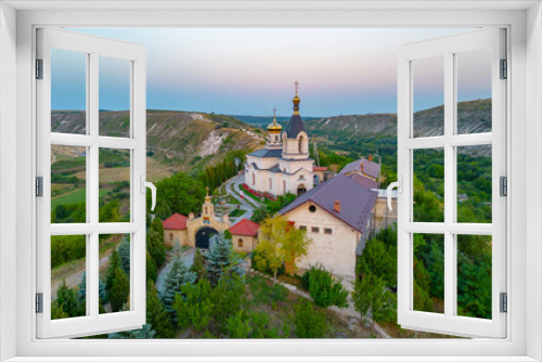 Sunset panorama of St. Mary's Church at Orheiul Vechi in Moldova