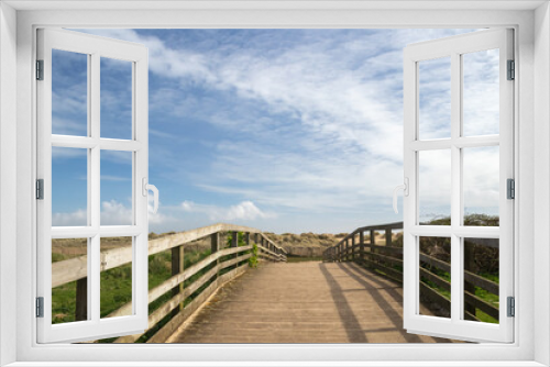 Fototapeta Naklejka Na Ścianę Okno 3D - Footbridge leading to Walberswick Beach in Suffolk, England, United Kingdom