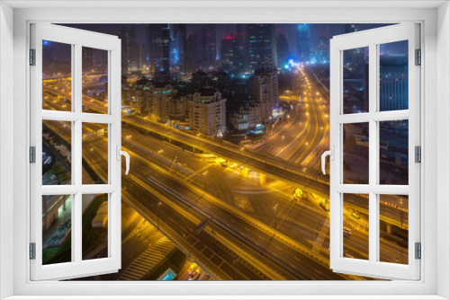 Fototapeta Naklejka Na Ścianę Okno 3D - Dubai downtown skyline night to day aerial timelapse with traffic on highway