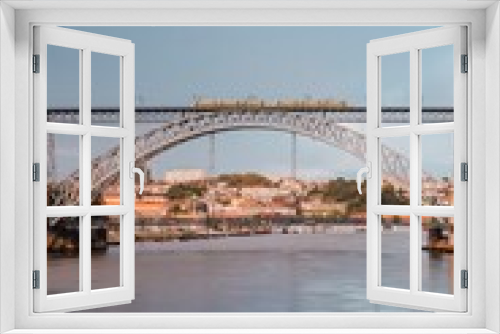 Fototapeta Naklejka Na Ścianę Okno 3D - Porto, Portugal. October 30, 2023: Panoramic view of the old town and the famous Dom Louis I bridge over the Douro River. Porto, Portugal.