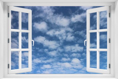 Blue sky background with clouds