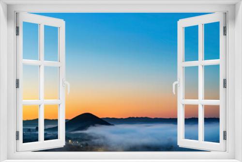 Fototapeta Naklejka Na Ścianę Okno 3D - panorama of view of valley, hills, fog, at sunset, sunrise