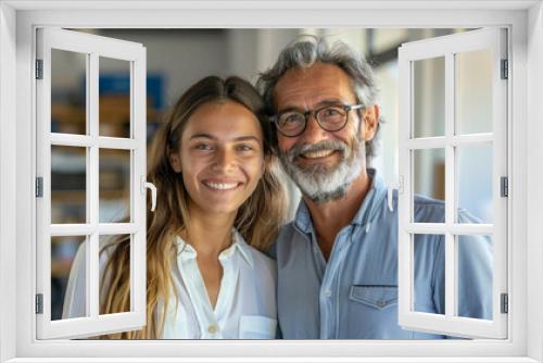 A man and a woman are smiling for the camera