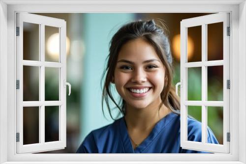 Portrait of a young hispanic nurse wearing scrubs in a nursing home