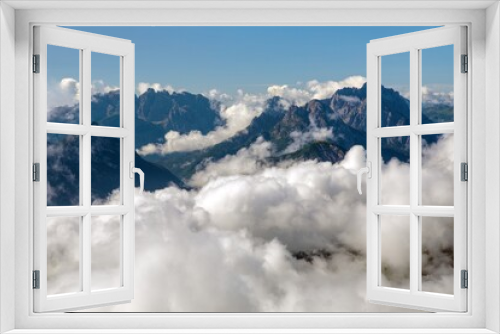 Fototapeta Naklejka Na Ścianę Okno 3D - Dolomites mountains in the middle of Clouds
