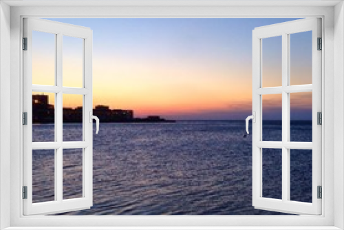 Fototapeta Naklejka Na Ścianę Okno 3D - Trieste's harbor view at sunset