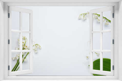 Fototapeta Naklejka Na Ścianę Okno 3D - Flat lay frame from spring flowers Lily of the valley (Convallaria majalis) on a white background. Beautiful floral frame. Springtime. Top view, flat lay. Space for text. 