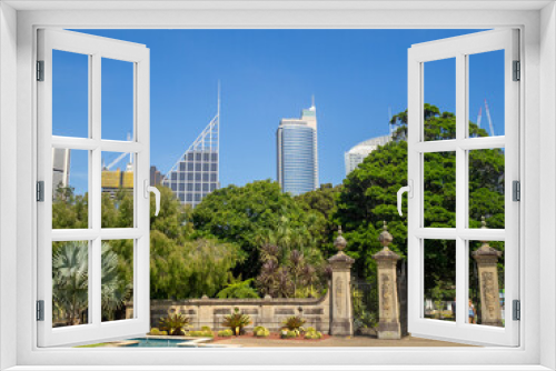 Fototapeta Naklejka Na Ścianę Okno 3D - Sydney's Royal Botanic Gardens entrance with CBD skyscrapers in background