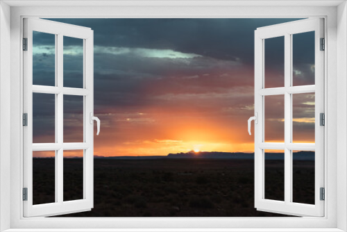 Fototapeta Naklejka Na Ścianę Okno 3D - Sunrise in the desert fields of the Monument Valley, Utah