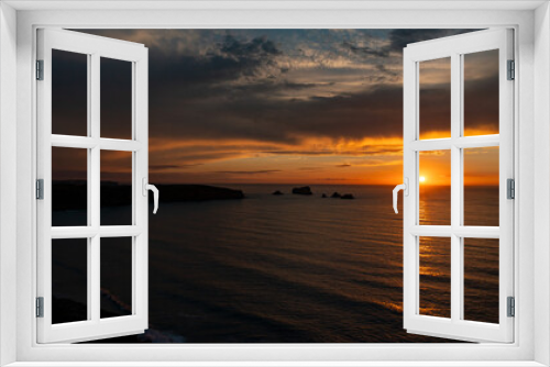 Fototapeta Naklejka Na Ścianę Okno 3D - beautiful landscape of a sunset over the sea and cliffs