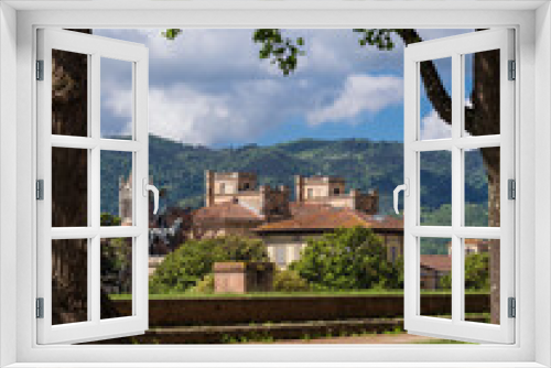 Fototapeta Naklejka Na Ścianę Okno 3D - View of San Concordio old district and Pisan Mountain Range from Lucca city walls public park