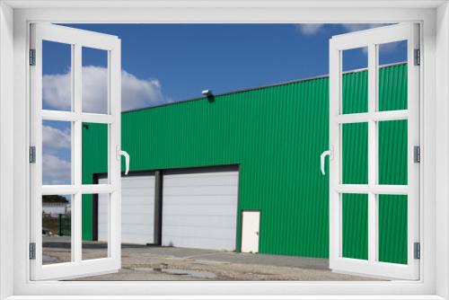 Fototapeta Naklejka Na Ścianę Okno 3D - The exterior of a modern warehouse