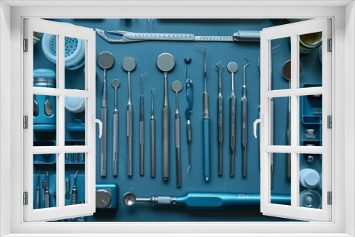 a table topped with a variety of dental instruments