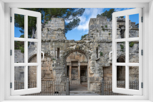 Fototapeta Naklejka Na Ścianę Okno 3D - Nîmes, France - 04 17 2024: The Gardens of The Fountain. View of the Temple of Diana.