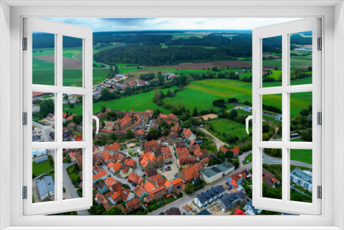 Fototapeta Naklejka Na Ścianę Okno 3D - Aerial view around the old town of the city Lichtenau on a cloudy day in Germany.