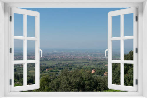 Fototapeta Naklejka Na Ścianę Okno 3D - Awe-inspiring panorama from the valley's edge, offering a glimpse of Rome's suburbs under the radiant sun and endless sky