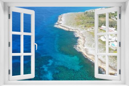 Fototapeta Naklejka Na Ścianę Okno 3D - Aerial view of Bodden Town Pedro St James Savannah with iron shore community pristine blue turquoise water of the Caribbean sea ocean, Grand Cayman, Cayman Islands