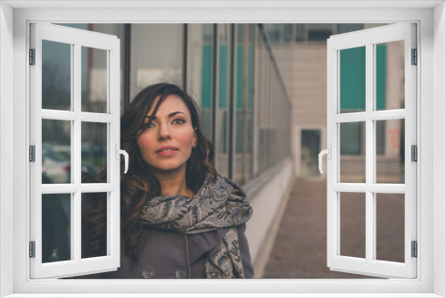 Beautiful girl posing in an urban context