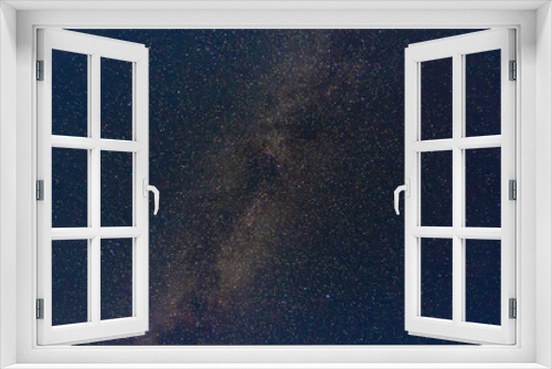 Fototapeta Naklejka Na Ścianę Okno 3D - Starry Night Sky. A vast night sky filled with countless stars and the Milky Way’s cosmic dust lanes.