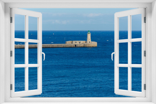 Fototapeta Naklejka Na Ścianę Okno 3D - Valletta,MALTA -CIRCA OCTOBER, 2015- lighthouse in Grand Harbour