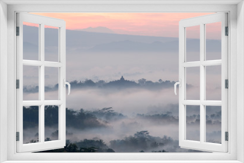 Fototapeta Naklejka Na Ścianę Okno 3D - hilltop view of Borobudur in mist