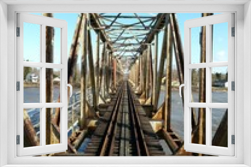 Fototapeta Naklejka Na Ścianę Okno 3D - Railway bridge over water
