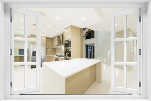 Modern white kitchen in new luxurious home