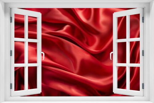 vibrant red satin fabric with luxurious sheen and smooth texture abstract photo