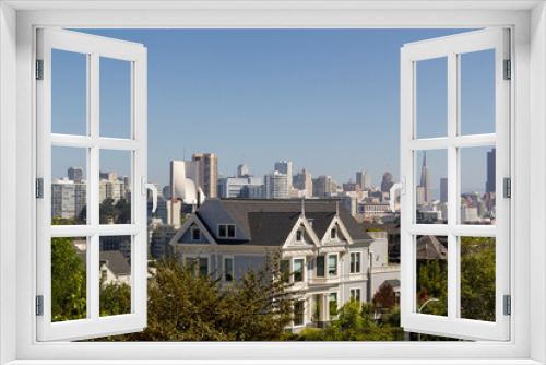 an beautiful and iconic view over the city of San Francisco with a architectonical mix of old houses and high-rise buildings