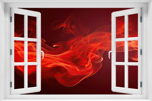 Red smoke flowing in motion creating an eye catching copy space image