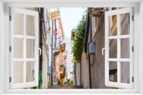 Fototapeta Naklejka Na Ścianę Okno 3D - narrow street in Catania city, Sicily