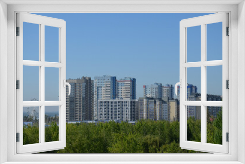the urban landscape of Volgograd. Lenin Avenue. View of the Ferris wheel