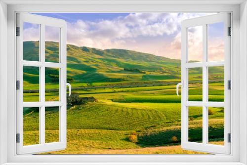 Fototapeta Naklejka Na Ścianę Okno 3D - beautiful rural landscape of green spring or summer season valley with flowering green hills and meadow and nice scenic sunset on background