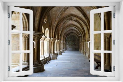 The cloister colonnade in the Old Cathedral of Coimbra (Se Velha de Coimbra), Portugal.