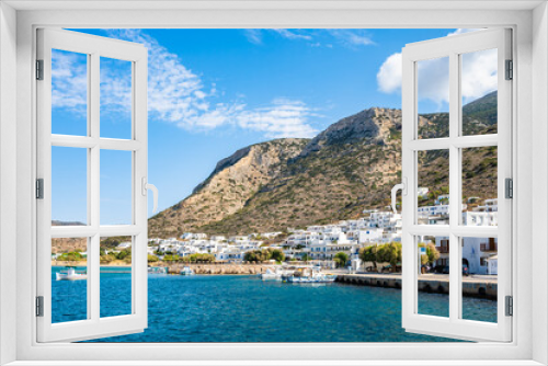 Fototapeta Naklejka Na Ścianę Okno 3D - View of Kamares port and village with white houses on hill in mountain landscape, Sifnos island, Greece