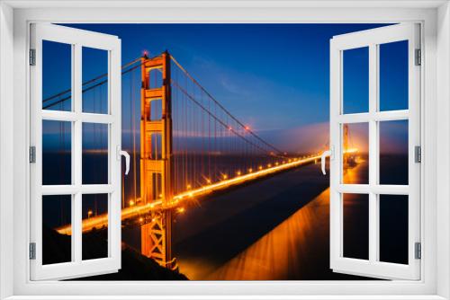Fototapeta Naklejka Na Ścianę Okno 3D - Night view of the Golden Gate Bridge and fog from Battery Spence