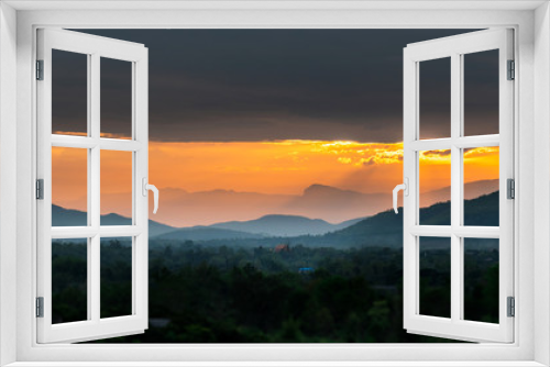 Fototapeta Naklejka Na Ścianę Okno 3D - Colorful sunset over the mountain hills