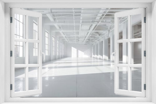 Empty white warehouse interior with clean, open space and a pristine white background, emphasizing the vast, uncluttered area