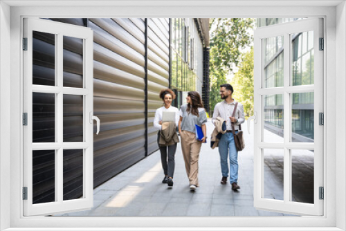 Career winner mindset. Group of young business people in front of office building. Confident dedicated business man and women learning and educate them self for better opportunity in business career.