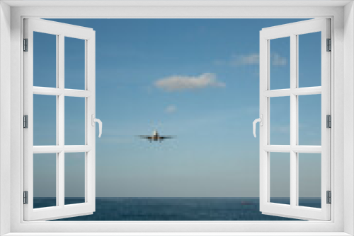 Fototapeta Naklejka Na Ścianę Okno 3D - Landing passenger jet airplane at daytime.