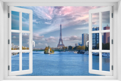 Fototapeta Naklejka Na Ścianę Okno 3D - Paris, the Grenelle bridge on the Seine, with the liberty statue, and the Eiffel Tower in background
