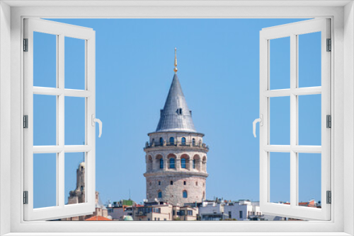 A closer look at the Galata Tower emphasises its medieval charm and architectural elegance with its solid stone walls and iconic conical roof.