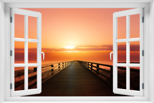 Fototapeta Naklejka Na Ścianę Okno 3D - Steg im Meer bei Sonnuntergang