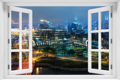Fototapeta Naklejka Na Ścianę Okno 3D - Blurred city lights and office buildings