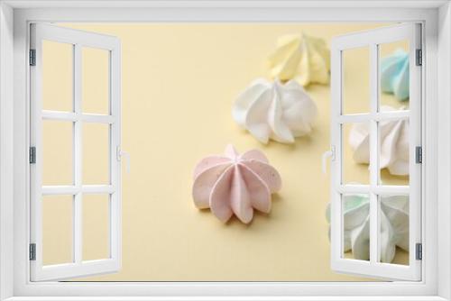 Fototapeta Naklejka Na Ścianę Okno 3D - Delicious meringue cookies on beige background, closeup. Space for text